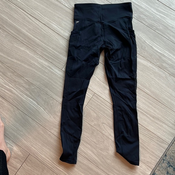 Fabletics xs navy blue leggings. Sheer side with side pockets - Picture 1 of 4